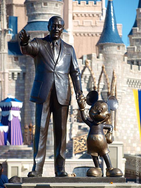 Disney Storytelling at it's finest. The Walt and Mickey Statue in from of Cinderella's Castle in the Magic Kingdom in Walt Disney World, Orlando Florida