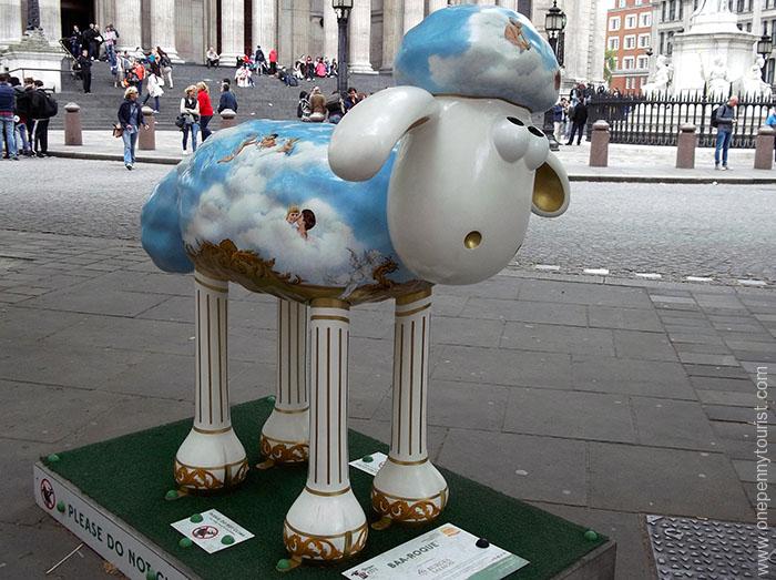 Painted with clouds and cherubs, Baa-roque Shaun looks up to the heavens outside St Paul's Cathedral
