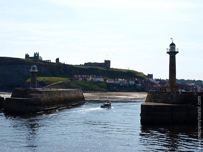 Looking back into Whitby Harbour in North Yorkshire, from the end of the sea wall