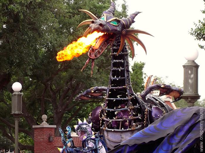 Maleficent breathing fire in the Festival of Fantasy Parade in the Magic Kingdom at Walt Disney World