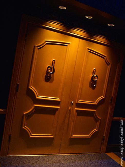 Mickey's Philharmagic theatre doors. Even their decoration is  musical (Magic Kingdom, Walt Disney World)