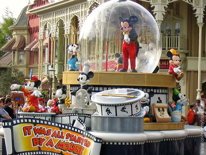 Mickey in the Share a Dream Come True Parade aka the Snow Globe Parade in the Magic Kingdom. No longer runs.